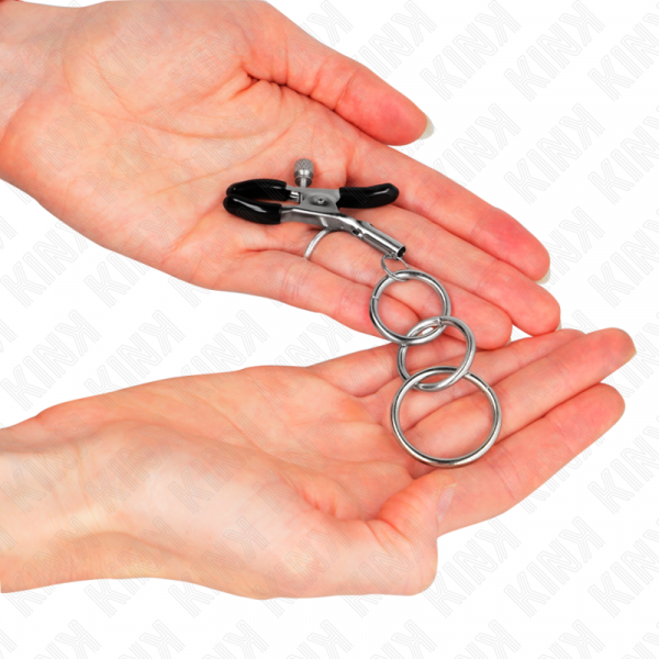 img_186623_9a9f2b0db8aa494e204f099d50b4c5ff_1.png KINK - PINZAS PARA PEZONES CON 3 AROS 6 CM