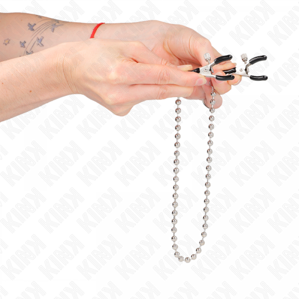 img_186660_c0fb1fb168e5b8676d74a19ca5ac674f_1.png KINK - PINZAS PARA PEZONES CON CADENA DE BOLAS 30 CM