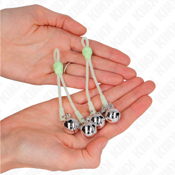 img_186759_778b05c4e5072bb74e8fbb60c8011e32_1.png KINK - PINZAS PARA PEZONES LUMINOSAS FORMA CALABERA CON CASCABEL SONORO AJUSTABLE VERDE / PLATEADO