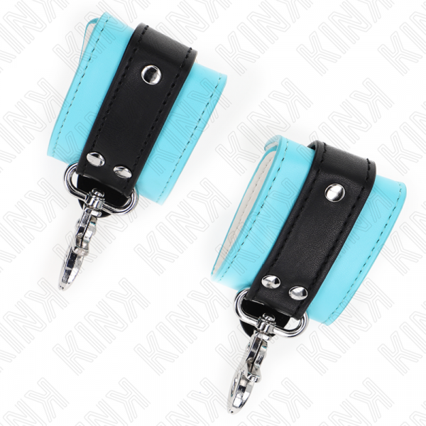 img_187369_51608695f45aa7b4ff8de50c8e6aff26_1.png KINK - MUÑEQUERAS CON CIERRE PREMIUM NEGRO / AZUL AJUSTABLE 21-28 CM X 5.5 CM