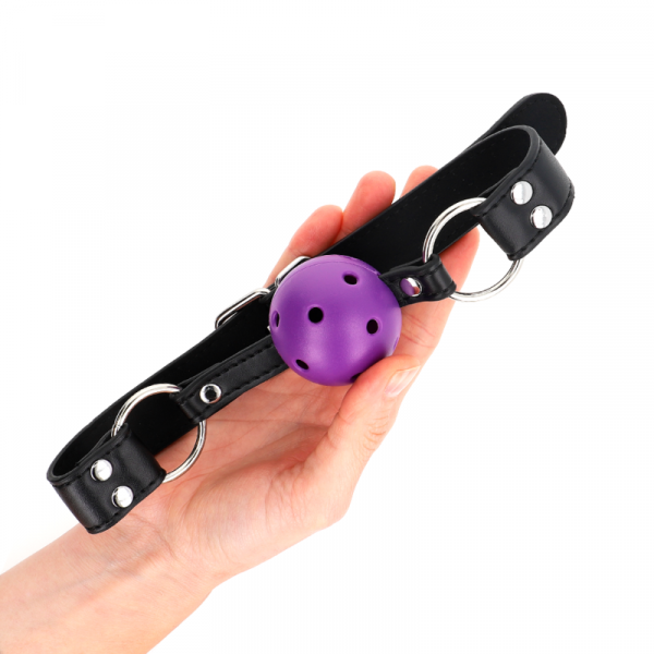 img_187712_ecaa7db1a667f1e86369497e26c6d159_1.png KINK - MORDAZA DE BOLA 4 CM TRANSPIRABLE CON DOBLE REMACHE MORADO 62 x 2.5 CM AJUSTABLE 42-58 CM