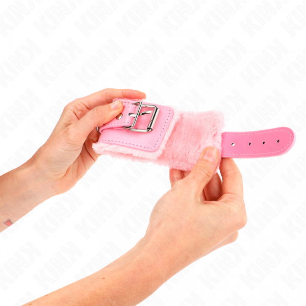 img_187753_05ce714cf7eec2e6ba7d59b2dcd563f7_1.png KINK - MUÑEQUERAS FORRADAS ROSA CON CORREA ROSA AJUSTABLE 20-29 CM X 5.5 CM