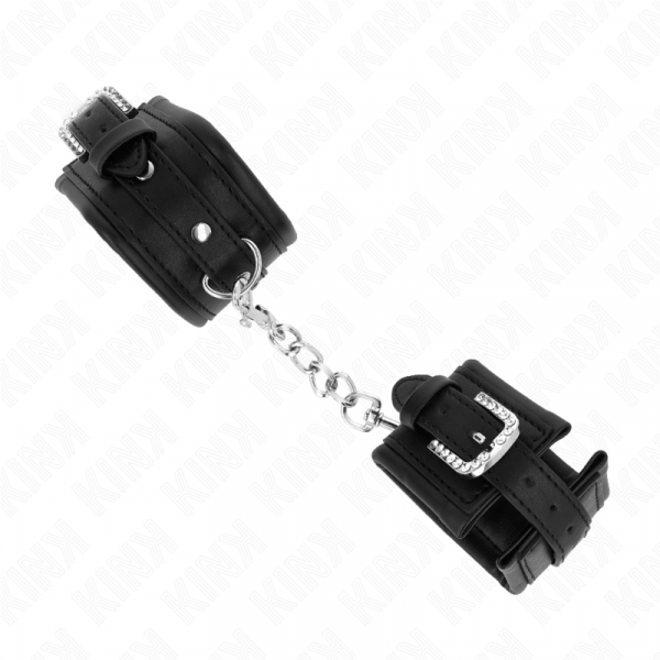 img_187756_d42b0252ec36ddafce773a976f31bec1_1.png KINK - MUÑEQUERAS NEGRO CON HEBILLA DE DIAMANTES DE IMITACIÓN AJUSTABLE 25-32 CM X 5.5 CM