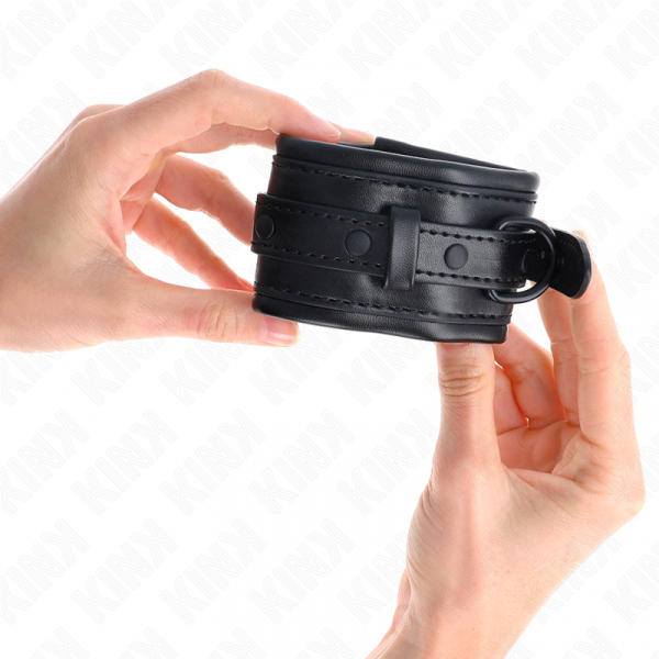 img_189173_0c81d735d32f0300227b8277b42a0057_1.png KINK - MUÑEQUERAS AJUSTABLE NEGRO 20-30 CM X 6 CM