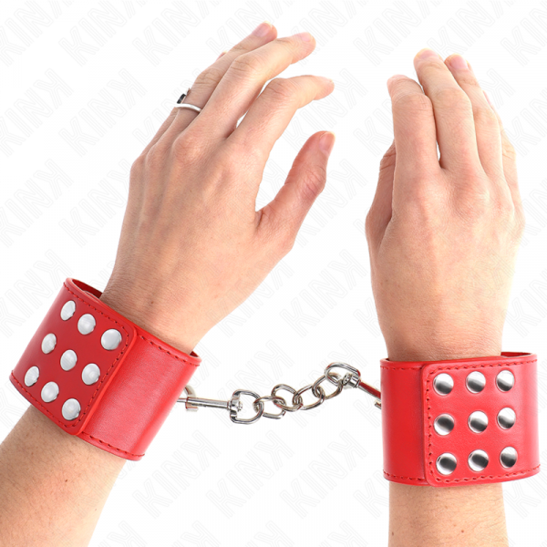 img_189202_93a96060fb475bdfc3f3312f32a4d7b5_1.png KINK - MUÑEQUERAS CON CIERRE A PRESIÓN AJUSTABLE ROJO 19-24 CM X 5.5 CM