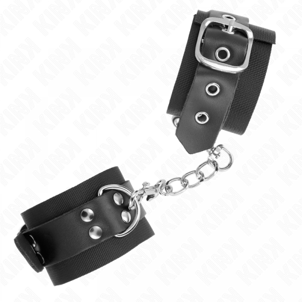 img_189268_535159855516e0fd1704a523fe9070f4_1.png KINK - MUÑEQUERAS DE NYLON NEGRO CON CORREA CUERO NEGRO AJUSTABLE 19-29 CM X 5.1 CM