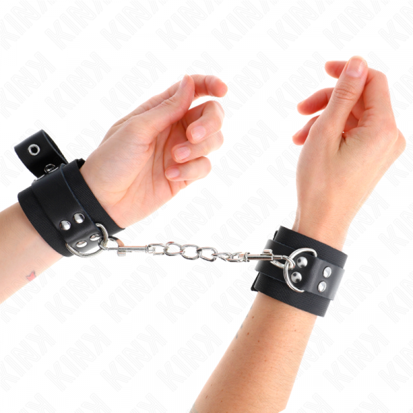 img_189270_fc49747742351a3087d8983d616d406a_1.png KINK - MUÑEQUERAS DE NYLON NEGRO CON CORREA CUERO NEGRO AJUSTABLE 19-29 CM X 5.1 CM