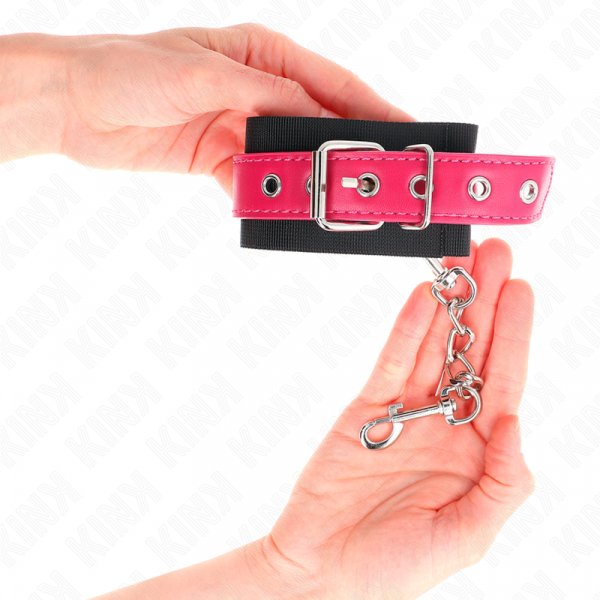 img_189272_55304a47b99892cf9844a41fcd803c5a_1.png KINK - MUÑEQUERAS DE NYLON NEGRO CON CORREA POLIPIEL FUSCIA AJUSTABLE 19-29 CM X 5.1 CM