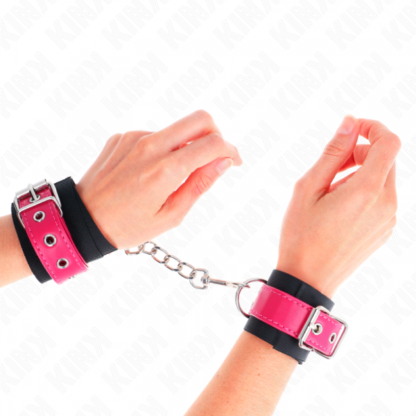img_189274_caf80c4044c63a913ac695fd8c198ad2_1.png KINK - MUÑEQUERAS DE NYLON NEGRO CON CORREA POLIPIEL FUSCIA AJUSTABLE 19-29 CM X 5.1 CM