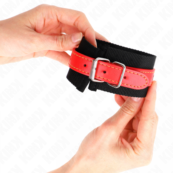 img_189277_602a5d55c3e58c19dcaf43fae015d9bc_1.png KINK - MUÑEQUERAS DE NYLON NEGRO CON CORREA POLIPIEL ROJO AJUSTABLE 19-24 CM X 5.5 CM