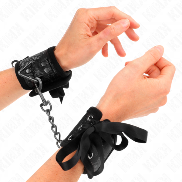 img_189281_32982e8b1bb3adaa3dd42cc9c345689e_1.png KINK - MUÑEQUERAS DISEÑO ESCÁNDALO NEGRO DETALLE LAZO 24.5 CM X 6.5 CM
