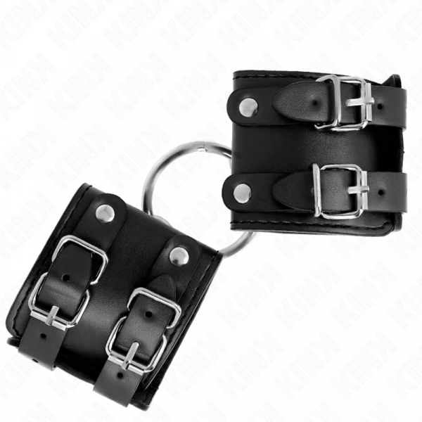 img_189308_9c8d098f081457796d8c611fe37589c6_1.png KINK - MUÑEQUERAS FIJAS CON ANILLA Y TACHUELAS NEGRO AJUSTABLE 17-22 CM X 6.5 CM