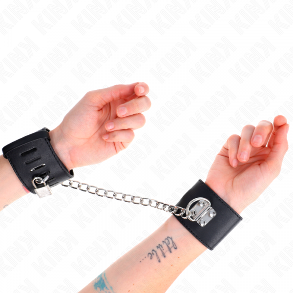 img_189318_e9b69b3af06fbc82e79d2ba6587f0408_1.png KINK - MUÑEQUERAS FIJAS CON CADENA 30 CM Y CIERRE CANDADO NEGRO AJUSTABLE 16-23 CM X 5.5 CM
