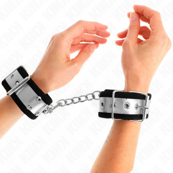 img_189330_57c80d32f3f2d614273665fe4296575b_1.png KINK - MUÑEQUERAS FINAS NEGRO / PLATEADO 30 X 4 CM