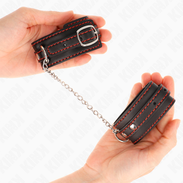 img_189503_1dfec40f308eafbaf0da3538c8a2e352_1.png KINK - MUÑEQUERAS PEQUEÑA NEGRO CON DETALLES EN ROJO AJUSTABLE 14-24 CM X 3.5 CM