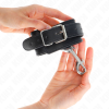 img_189526_6b7e37027f5169830fc6501409622b32_1.png KINK - MUÑEQUERAS SIMPLES CON FILA DE REMACHES Y HEBILLA GRANDE NEGRO AJUSTABLE 17-28 CM X 5 CM