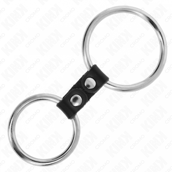 img_193428_1139ab58e8b326c67454bda0b4dd2457_1.png KINK - ANILLO PENE DOBLE METAL 3.7 CM A 5 CM CONECTADOS POR CORREA POLIPIEL MODELO 2